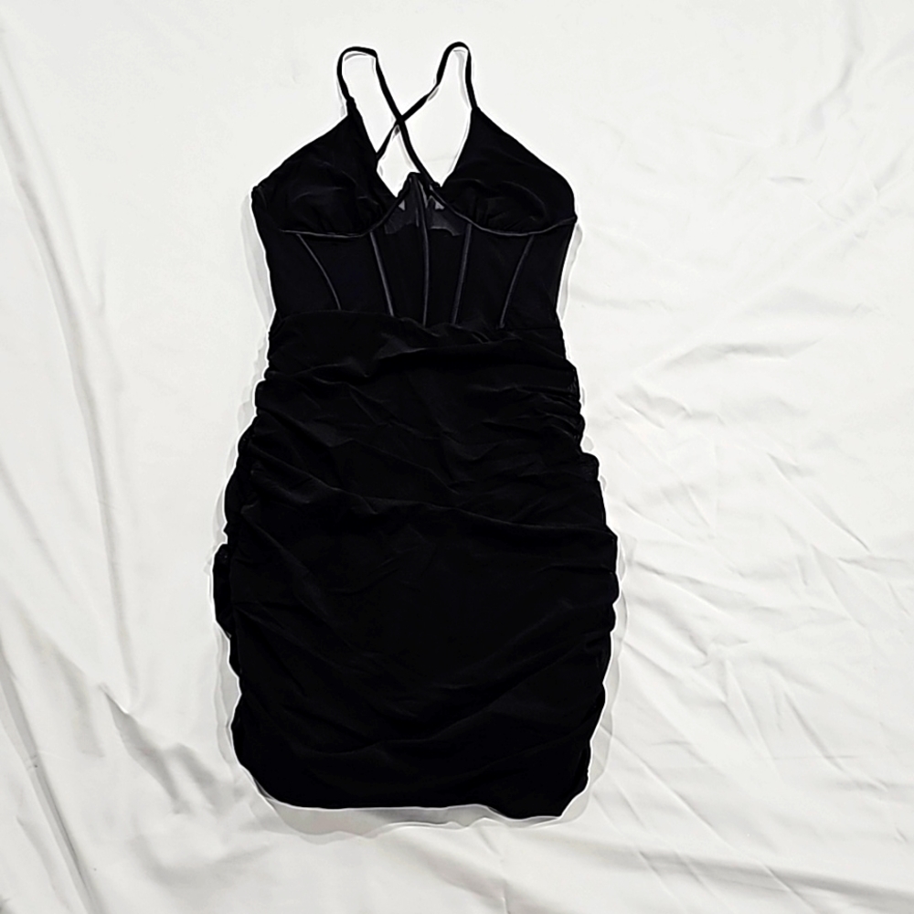 Black mini dress.  Size M. New without Tags. Boutique Juniors Fashion
